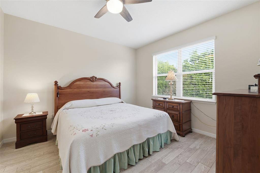 799 Asturias Road Davenport, FL 33837 - Photo 9 of 19 a bedroom with a bed and a window