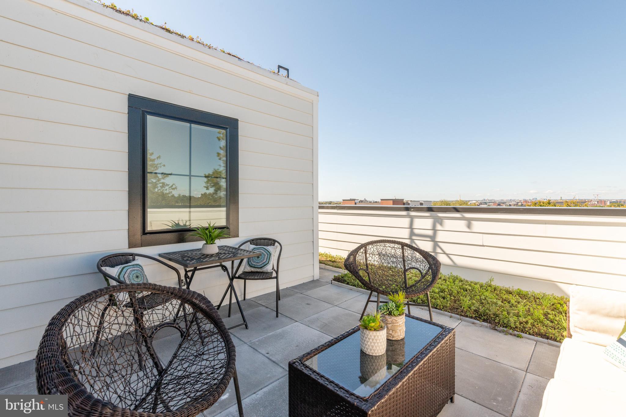 1011 18th Street Northeast, Unit PH7 Washington, DC 20002 - Photo 13 of 32 Private roof deck with city views
