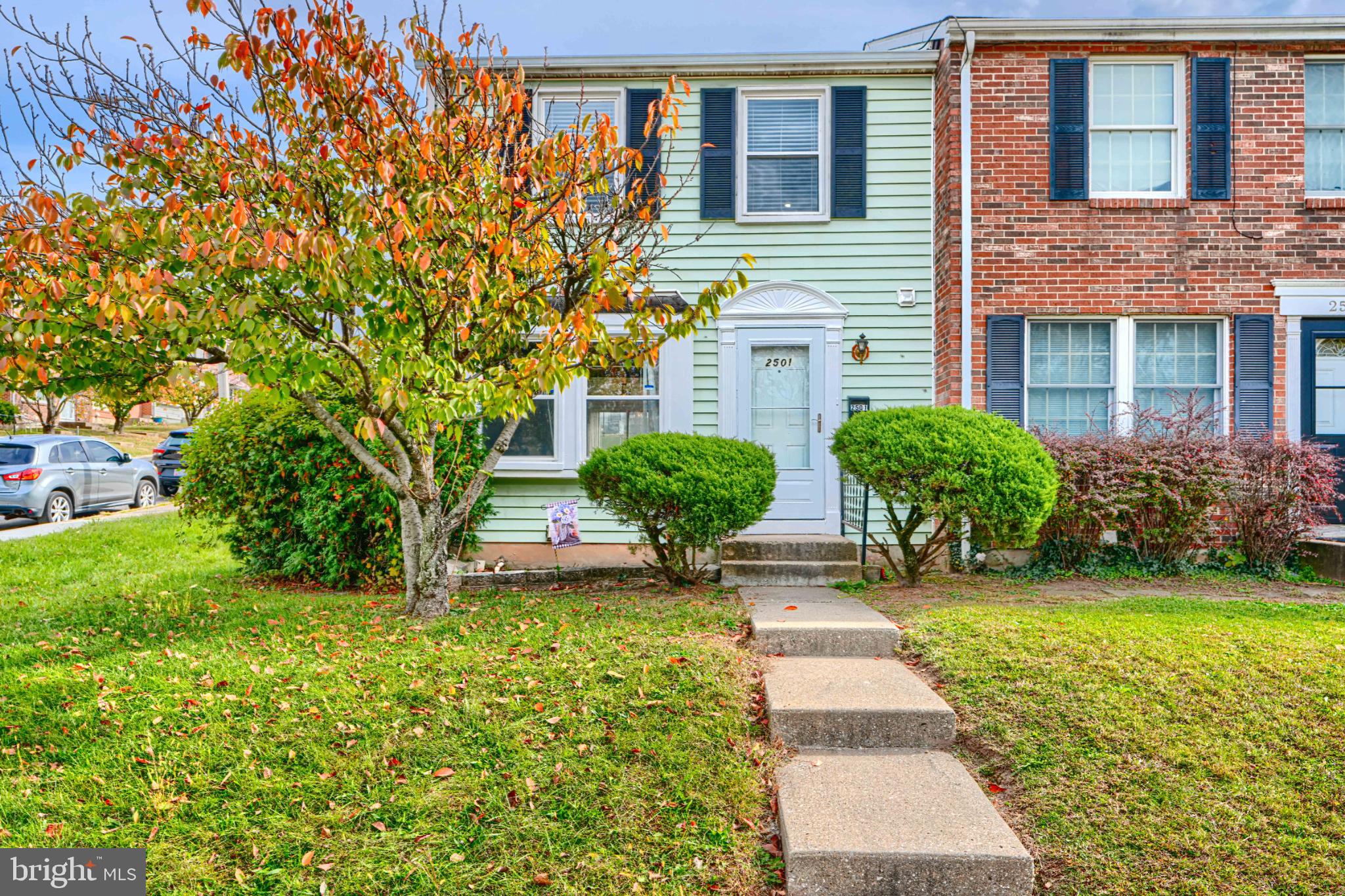a house view with a garden space