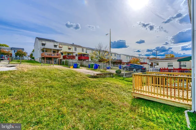 a view of swimming pool with outdoor seating