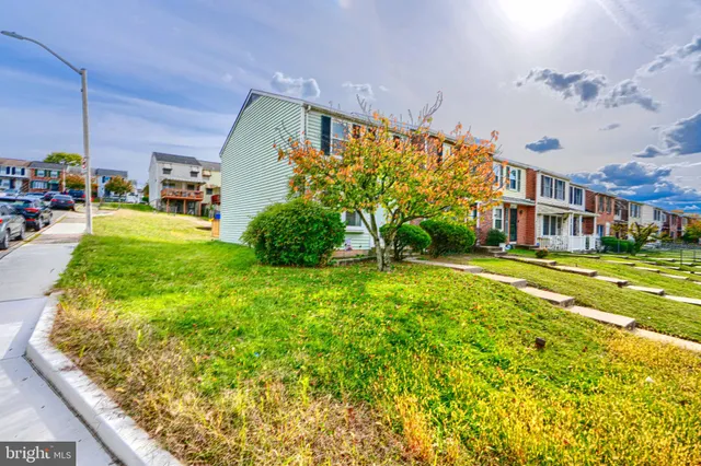 a swimming pool view with a outdoor seating space