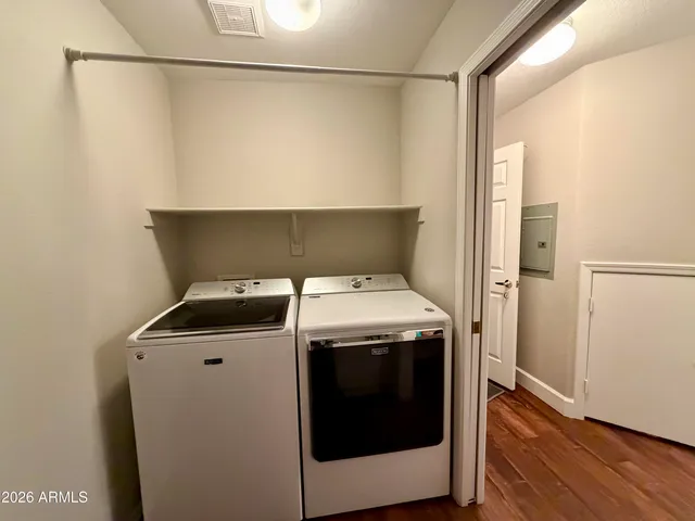 a utility room with dryer and washer