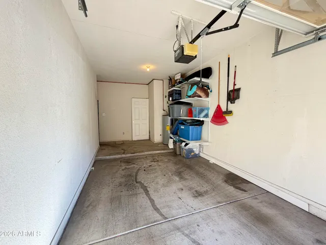 a view of a garage with stairs