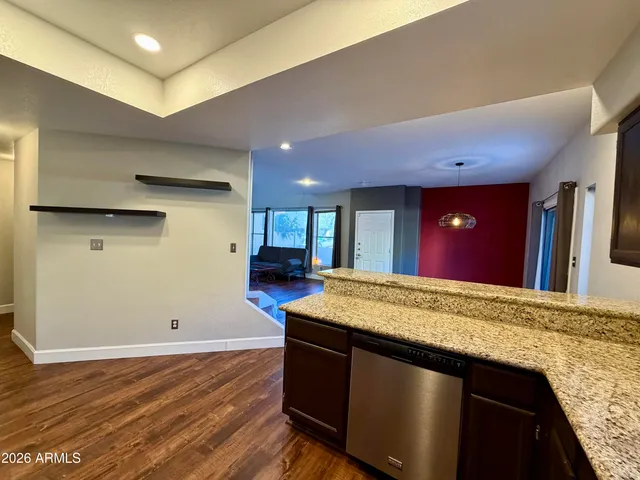 a view of kitchen with wooden floor