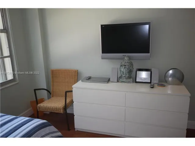 a bathroom with a sink toilet and vanity