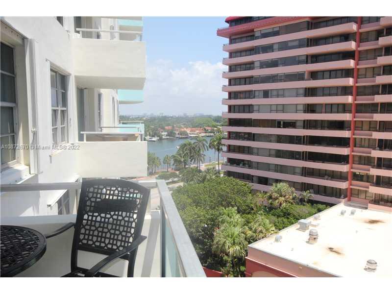 5161 Collins Avenue, Unit 902 Miami Beach, FL 33140 - Photo 21 of 43 a view of a balcony and floor to ceiling windows