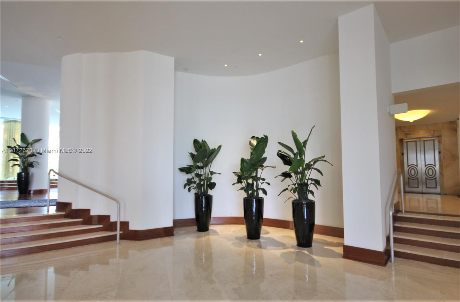 5161 Collins Avenue, Unit 902 Miami Beach, FL 33140 - Photo 34 of 43 a view of entryway with a potted plant
