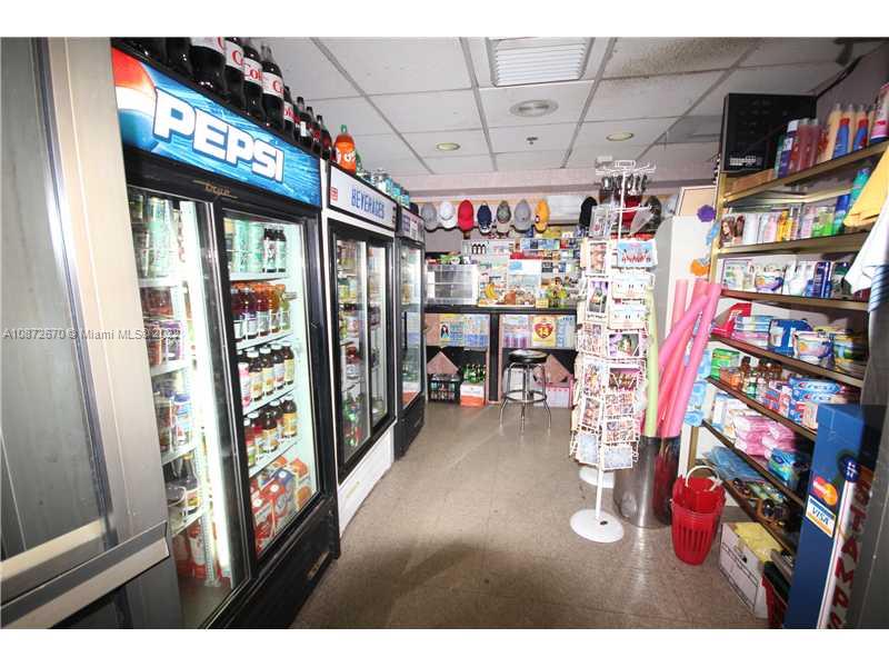 5161 Collins Avenue, Unit 902 Miami Beach, FL 33140 - Photo 38 of 43 a utility room with lot of items