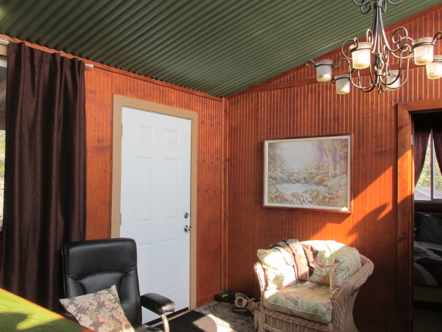 92-8629 Koa Lane Ocean View, HI 96704 - Photo 6 of 12 a room with furniture and a window