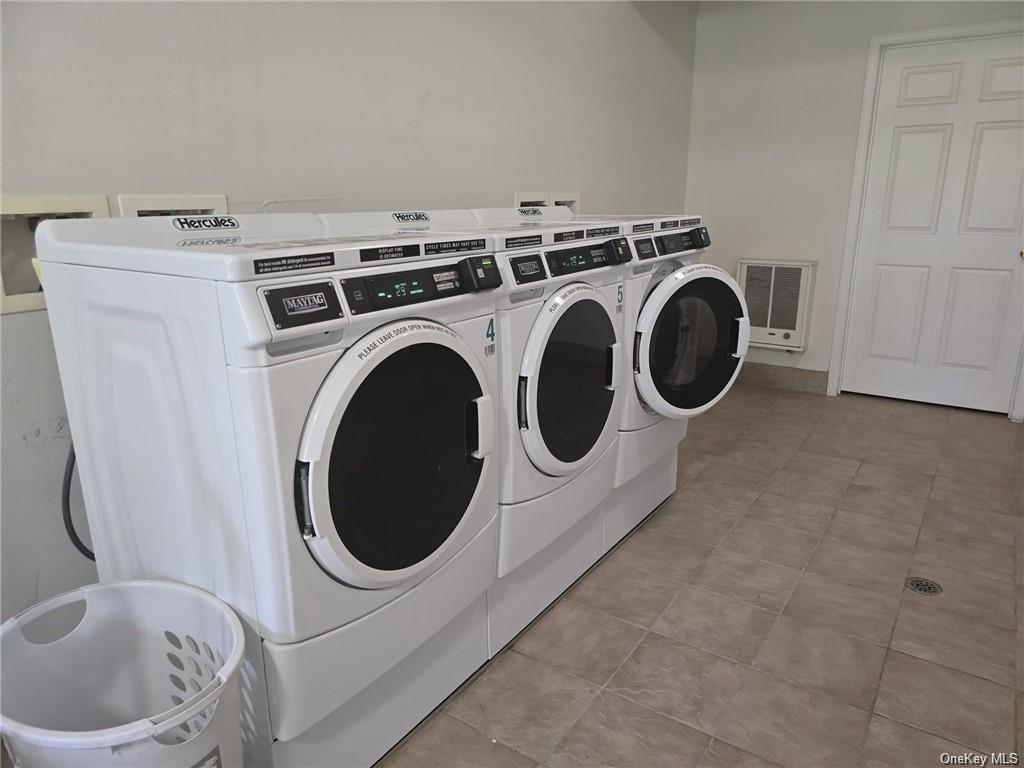 105 South Montgomery Street, Unit B1 4 Walden, NY 12586 - Photo 16 of 20 Clothes washing area with washer and clothes dryer