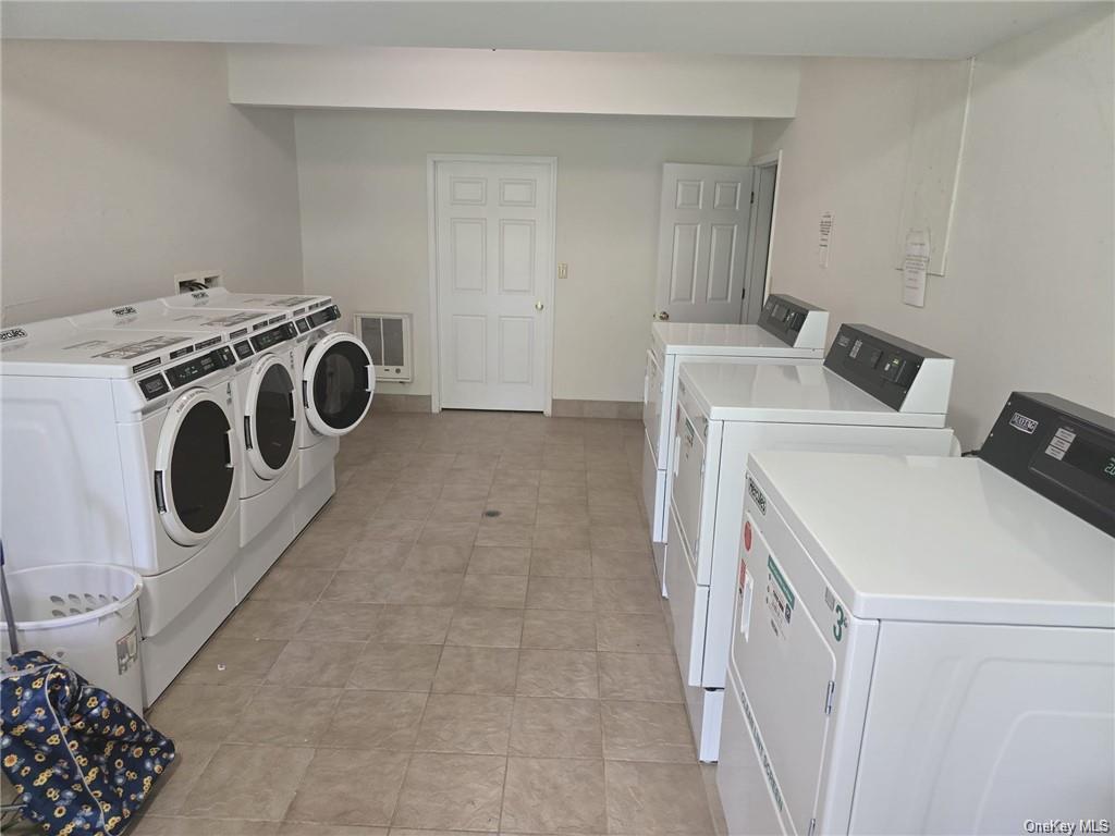 105 South Montgomery Street, Unit B1 4 Walden, NY 12586 - Photo 17 of 20 Laundry room featuring light tile patterned floors and washer and dryer
