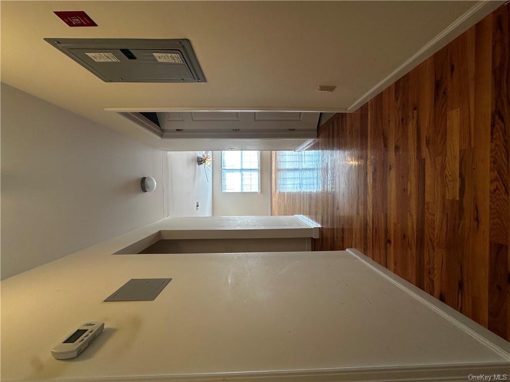 105 South Montgomery Street, Unit B1 4 Walden, NY 12586 - Photo 9 of 20 Hallway featuring dark hardwood / wood-style flooring