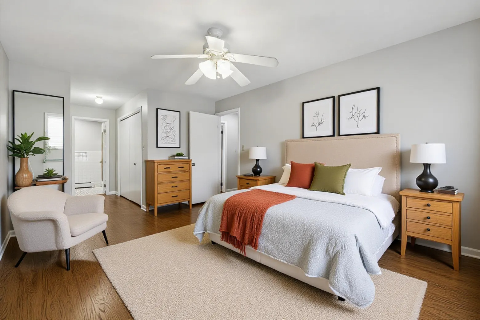 7801 Niles Center Road, Unit 102 Skokie, IL 60077 - Photo 12 of 20 a bedroom with a bed and a chandelier