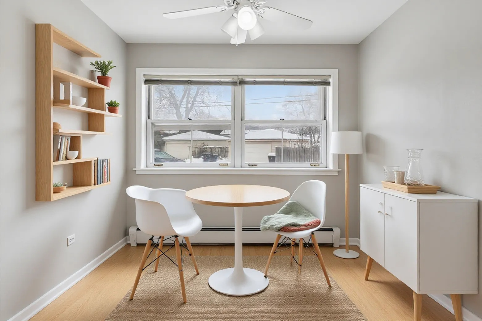 7801 Niles Center Road, Unit 102 Skokie, IL 60077 - Photo 10 of 20 a living room with furniture a window and a chandelier