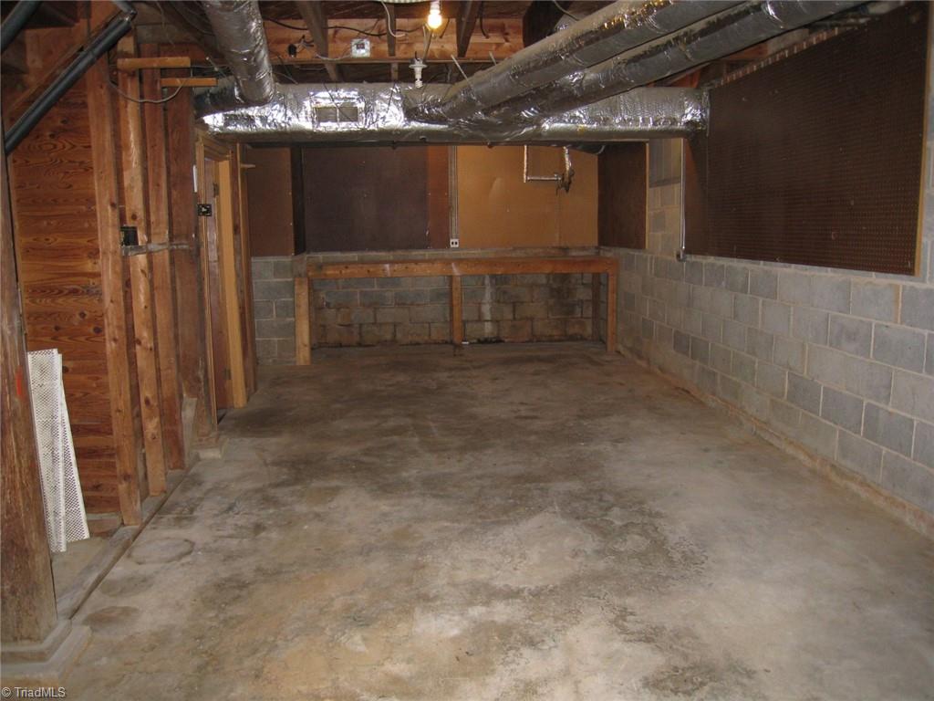 951 West Dodson Mill Road Pilot Mountain, NC 27041 - Photo 35 of 36 Basement Laundry