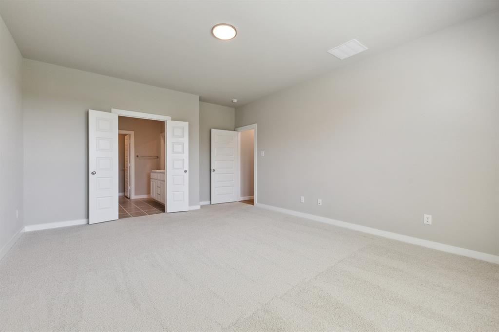 676 Poppy Lane Lavon, TX 75166 - Photo 21 of 35 Primary suite in the Masters home plan by Trophy Signature Homes – REPRESENTATIVE PHOTO