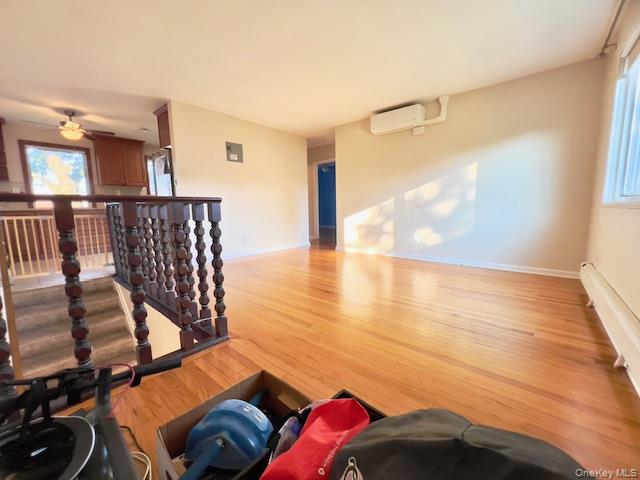 216-37 68th Avenue, Unit 2 Queens, NY 11364 - Photo 15 of 27 a view of a livingroom with furniture and staircase