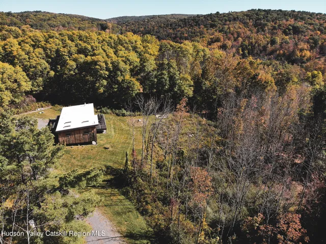 a view of a house with a big yard
