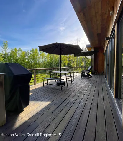 a view of backyard with green space