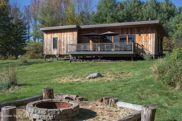 a kitchen with stainless steel appliances granite countertop a stove and refrigerator
