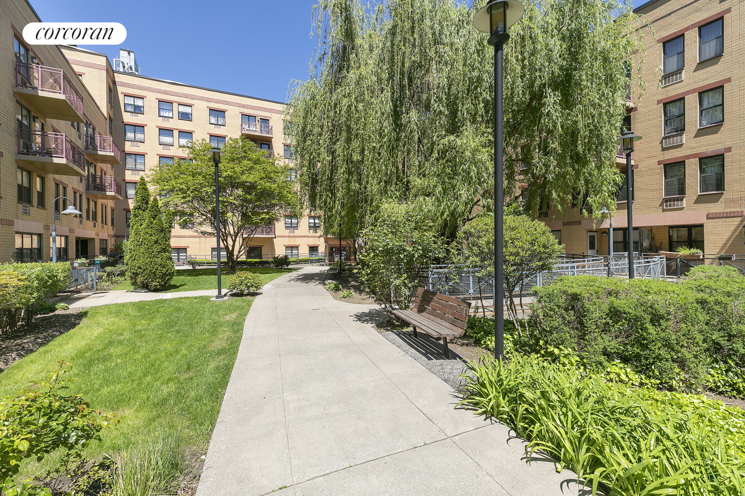 1901 Madison Avenue, Unit 218 Manhattan, NY 10035 - Photo 11 of 13 a view of a building with garden