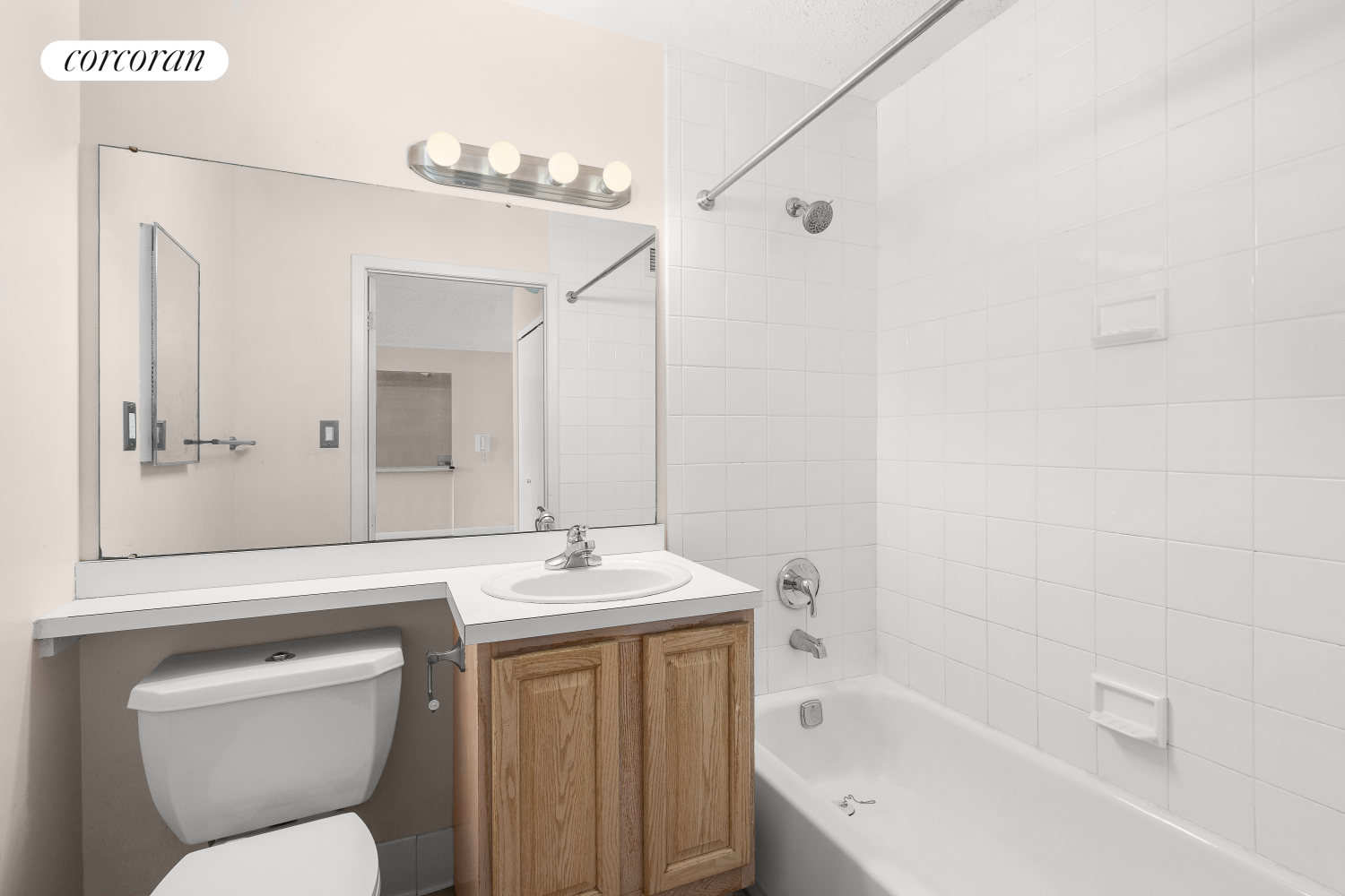 1901 Madison Avenue, Unit 218 Manhattan, NY 10035 - Photo 6 of 13 a bathroom with a toilet sink and bathtub