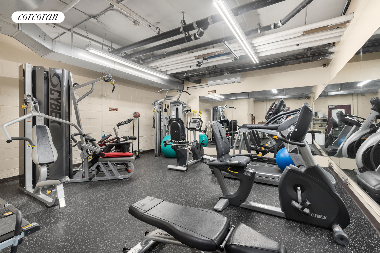 1901 Madison Avenue, Unit 218 Manhattan, NY 10035 - Photo 8 of 13 a view of a room with gym equipment