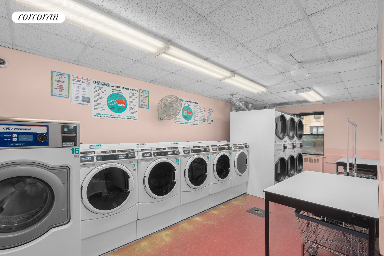 1901 Madison Avenue, Unit 218 Manhattan, NY 10035 - Photo 9 of 13 a utility room with dryer and washer