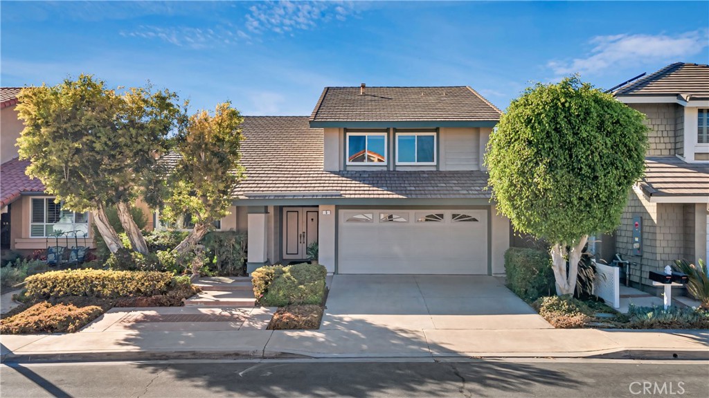 5 Candela Irvine, CA 92620 - Photo 1 of 1 a front view of a house with a yard