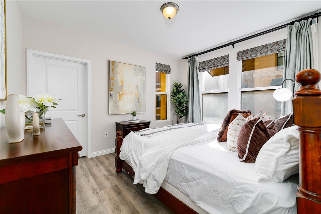 408 West Main Street, Unit 2G Alhambra, CA 91801 - Photo 13 of 30 a bedroom with a bed and a window