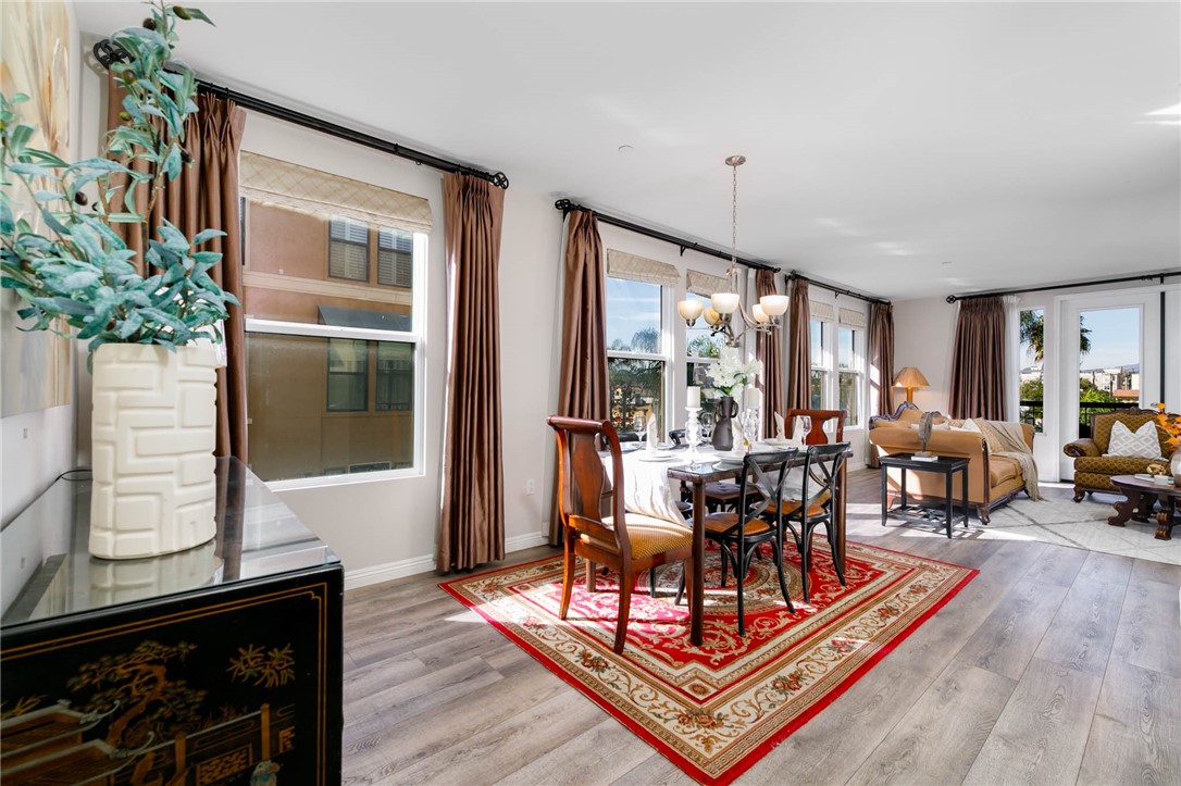 408 West Main Street, Unit 2G Alhambra, CA 91801 - Photo 4 of 30 a living room with furniture a large window and wooden floor