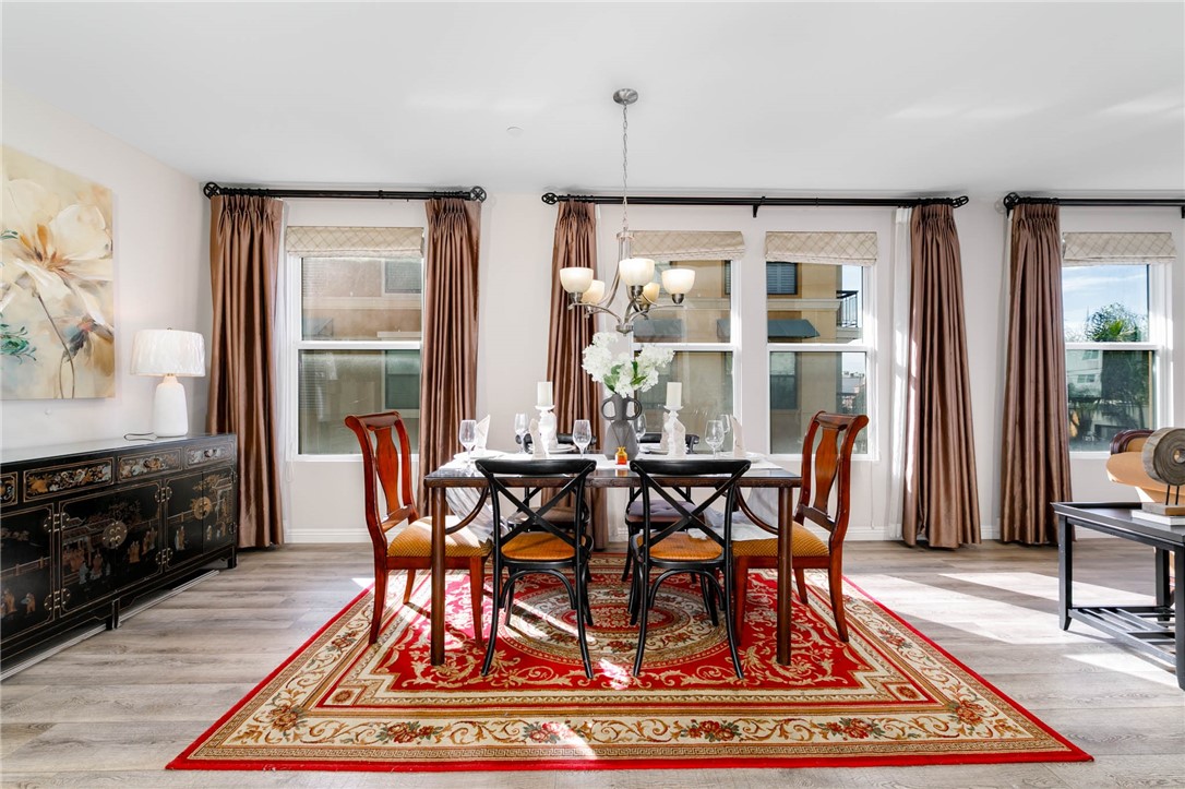 408 West Main Street, Unit 2G Alhambra, CA 91801 - Photo 5 of 30 a view of a dining room with furniture window and wooden floor