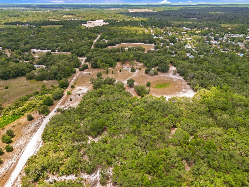 1 EAST Rd Spring Hill Hudson, FL 34667 - Photo 3 of 41 an aerial view of residential houses with outdoor space