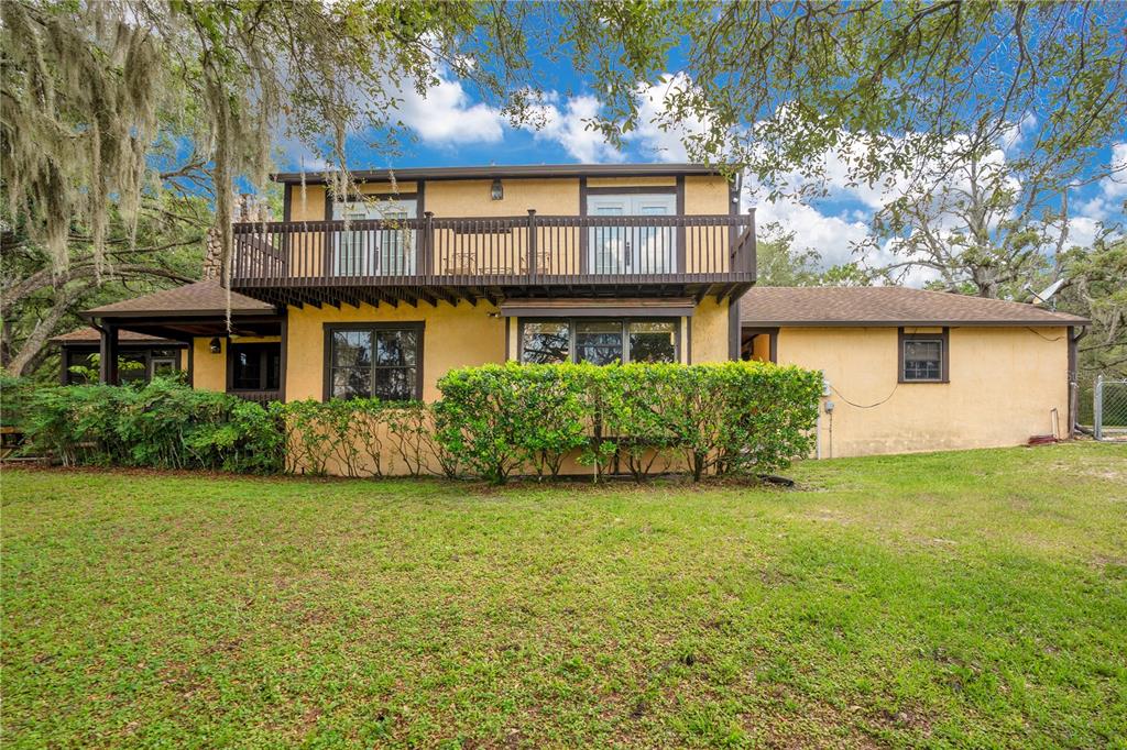 1 EAST Rd Spring Hill Hudson, FL 34667 - Photo 33 of 41 a house view with a garden space
