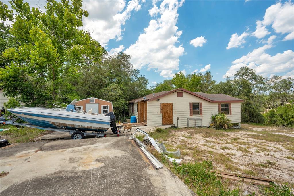 1 EAST Rd Spring Hill Hudson, FL 34667 - Photo 35 of 41 a house view with a sitting space and garden space
