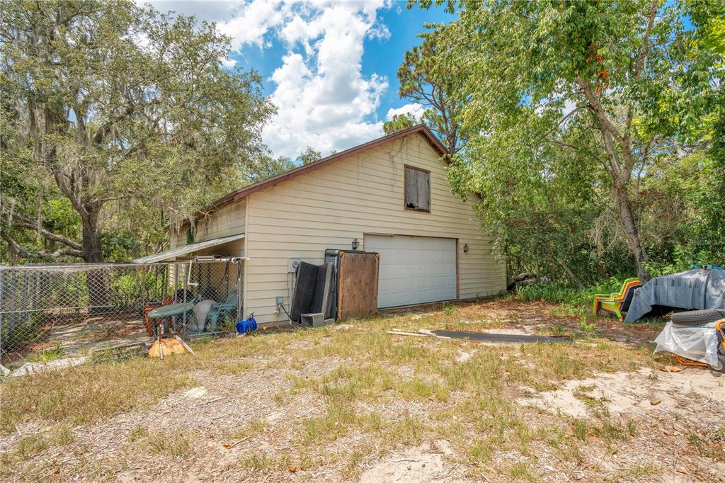 1 EAST Rd Spring Hill Hudson, FL 34667 - Photo 36 of 41 a view of a backyard of the house