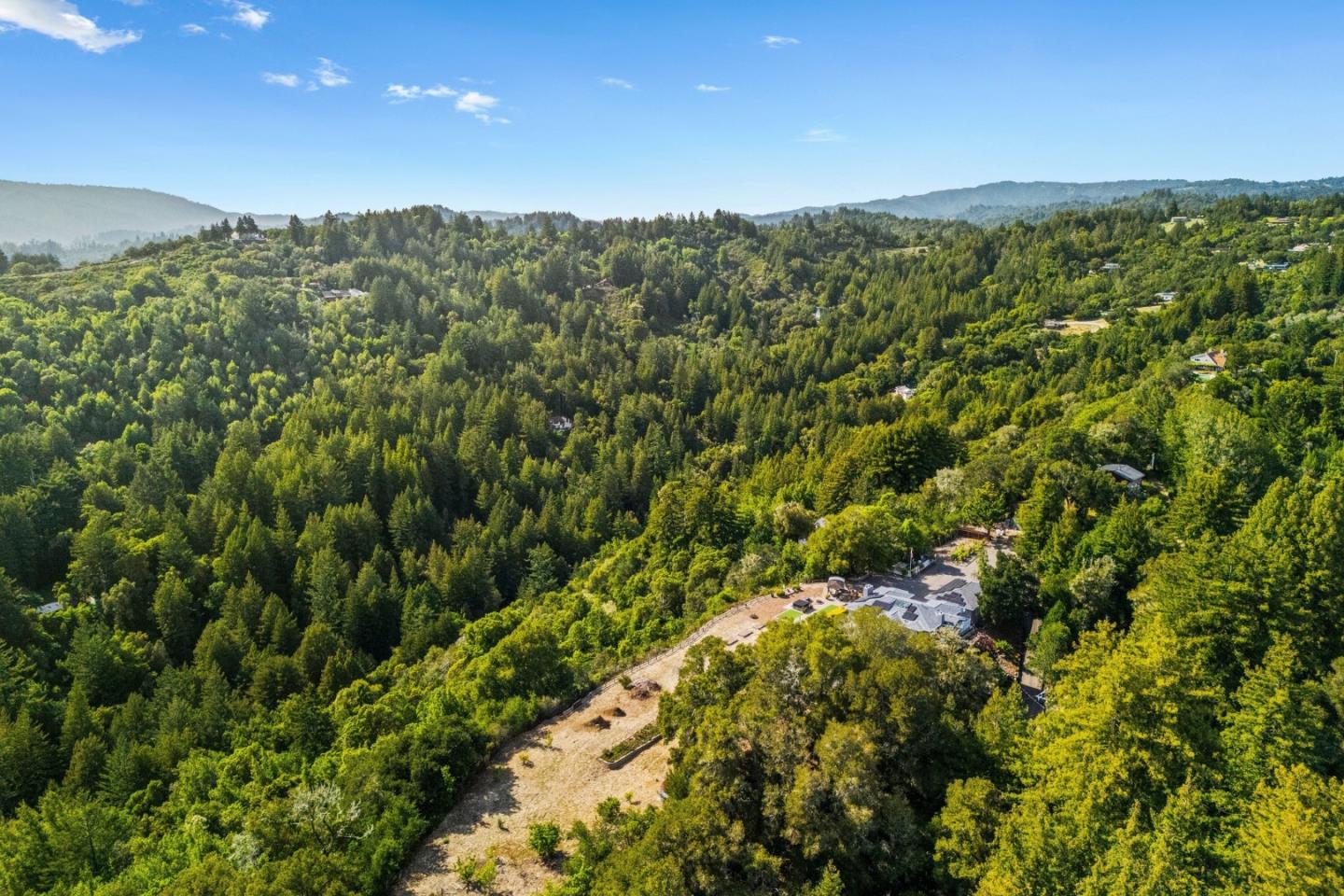 2500 Nelson Road Scotts Valley, CA 95066 - Photo 54 of 77 a view of a lush green forest with a mountain in the background