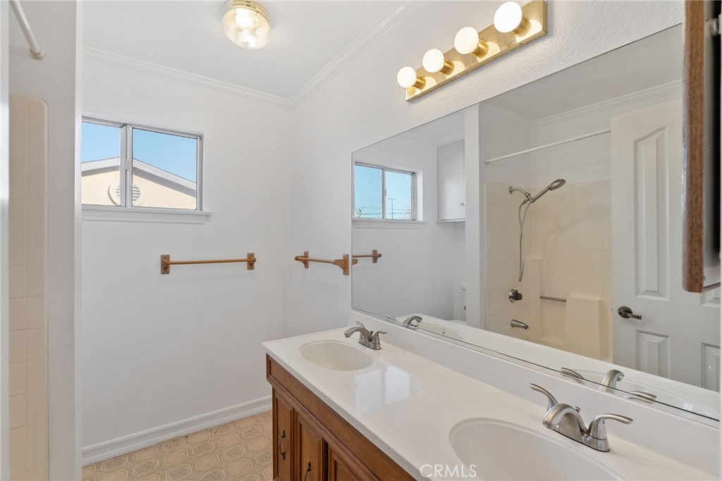 57622 Sierra Way Yucca Valley, CA 92284 - Photo 29 of 75 a bathroom with a sink and a mirror