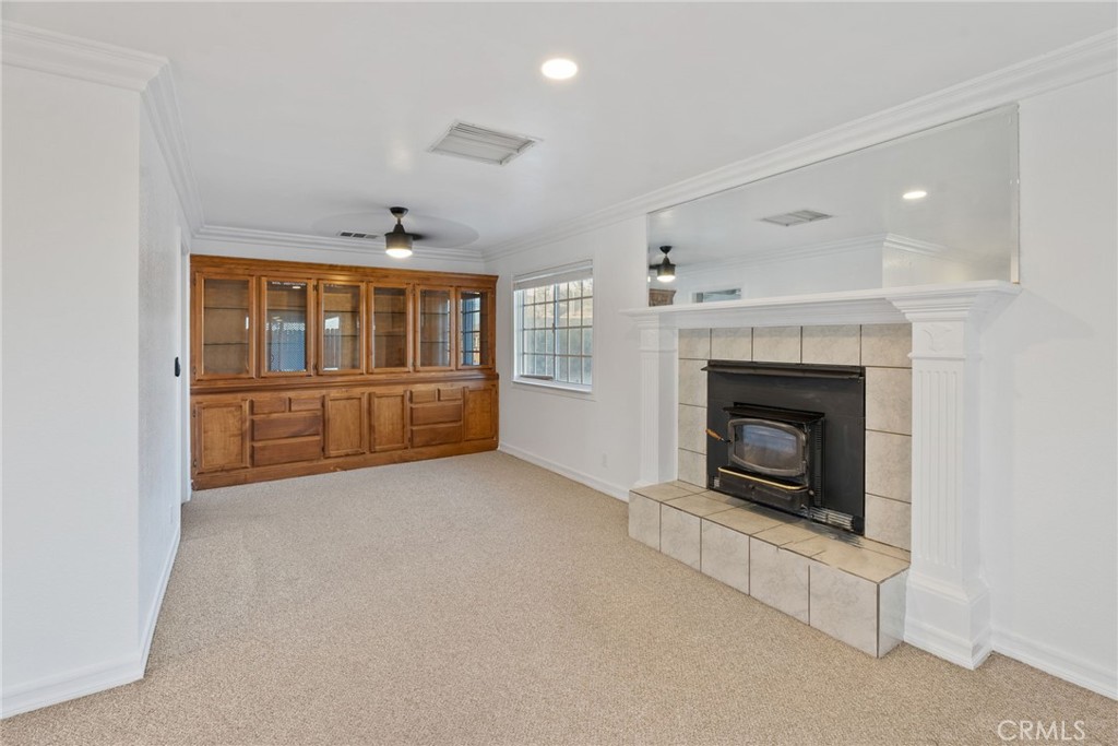 57622 Sierra Way Yucca Valley, CA 92284 - Photo 46 of 75 an empty room with furniture and fireplace