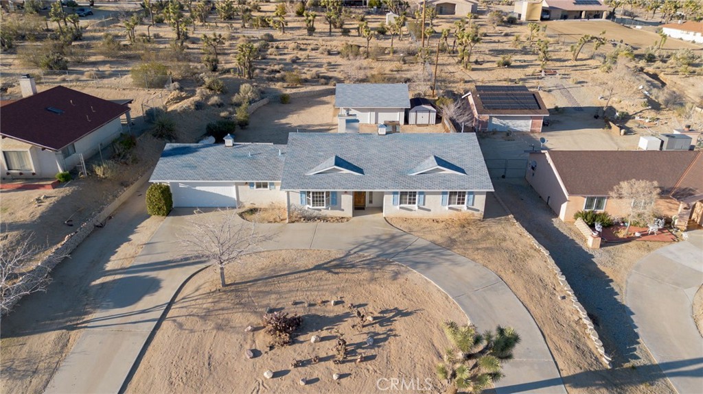 57622 Sierra Way Yucca Valley, CA 92284 - Photo 72 of 75 an aerial view of a house with a swimming pool