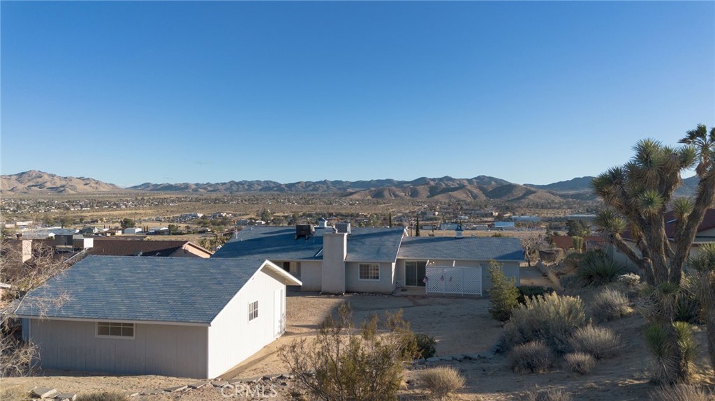 57622 Sierra Way Yucca Valley, CA 92284 - Photo 73 of 75 a view of a house with a mountain