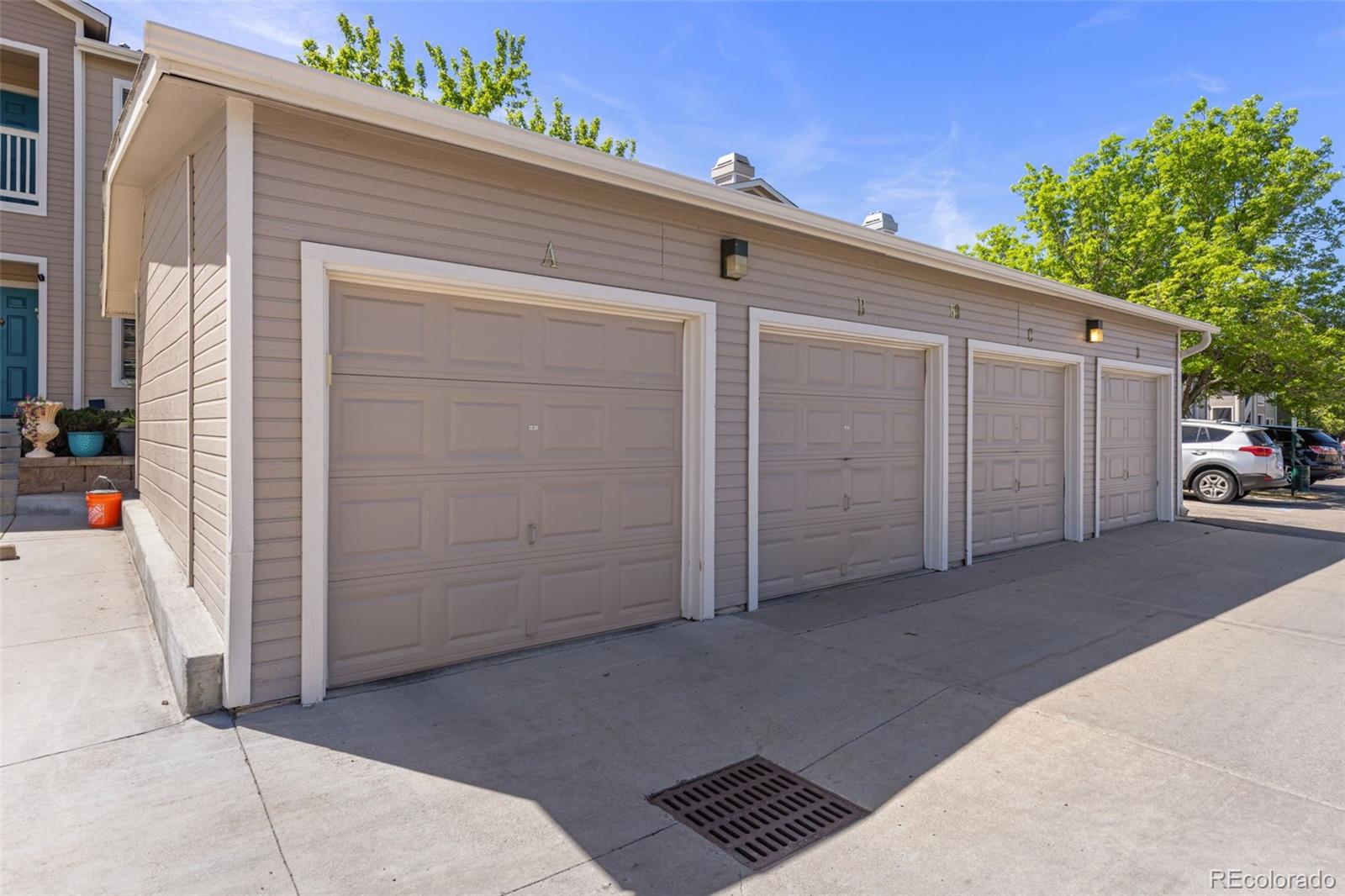 8334 Pebble Creek Way, Unit 201 Highlands Ranch, CO 80126 - Photo 25 of 28 a view of backyard and utility house