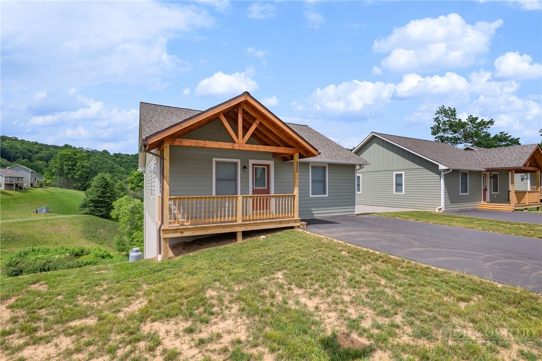 233 Ava Way, Unit 109 Boone, NC 28607 - Photo 2 of 27 a front view of a house with garden