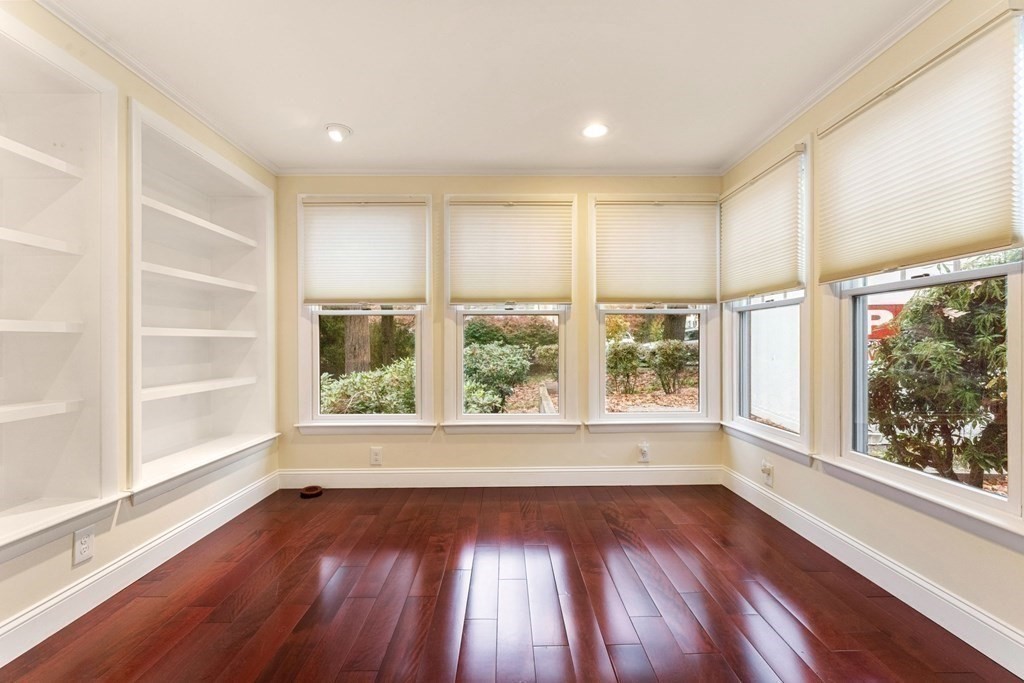 575 Chestnut Street Newton, MA 02468 - Photo 11 of 30 a view of an empty room with wooden floor and a window
