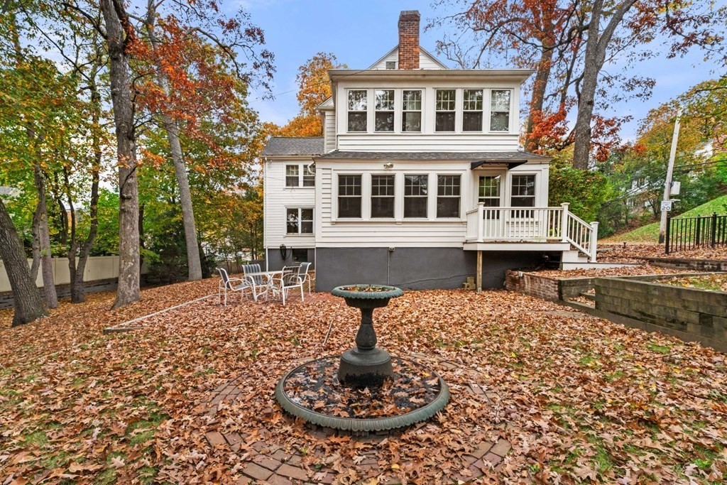 575 Chestnut Street Newton, MA 02468 - Photo 30 of 30 a front view of a house with a yard