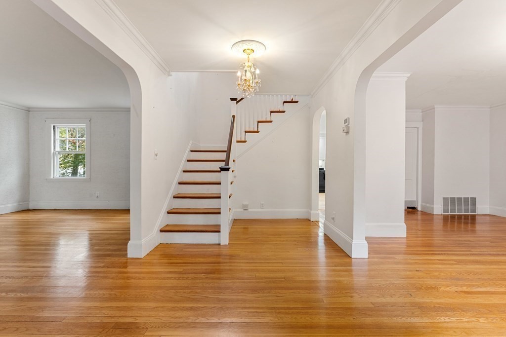 575 Chestnut Street Newton, MA 02468 - Photo 3 of 30 a view of entryway and hall with wooden floor