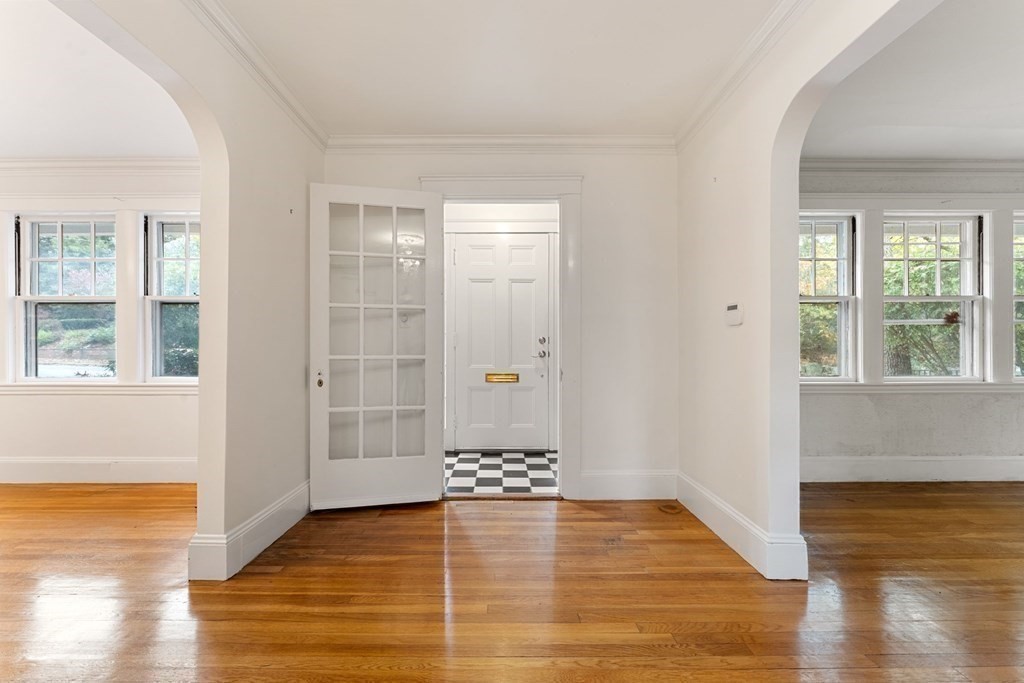 575 Chestnut Street Newton, MA 02468 - Photo 10 of 30 a view of an empty room with window and wooden floor