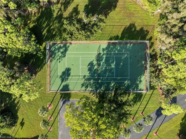 a view of a swimming pool with a lake view