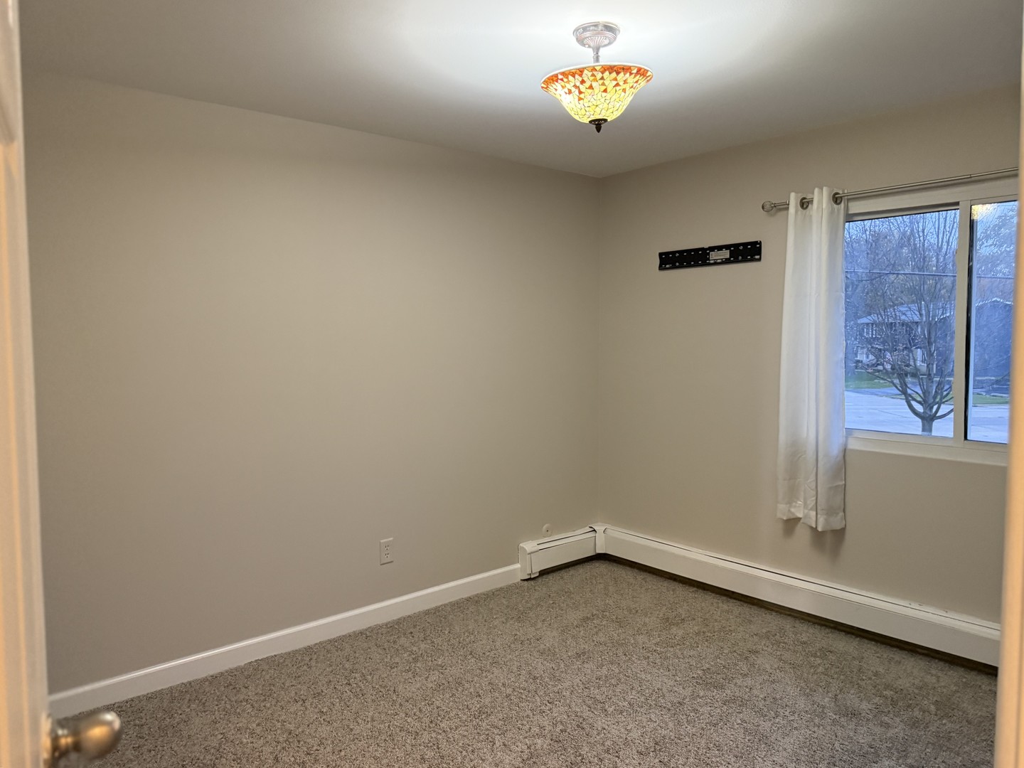 19380 Wolf Road, Unit 5 Mokena, IL 60448 - Photo 13 of 20 an empty room with a window