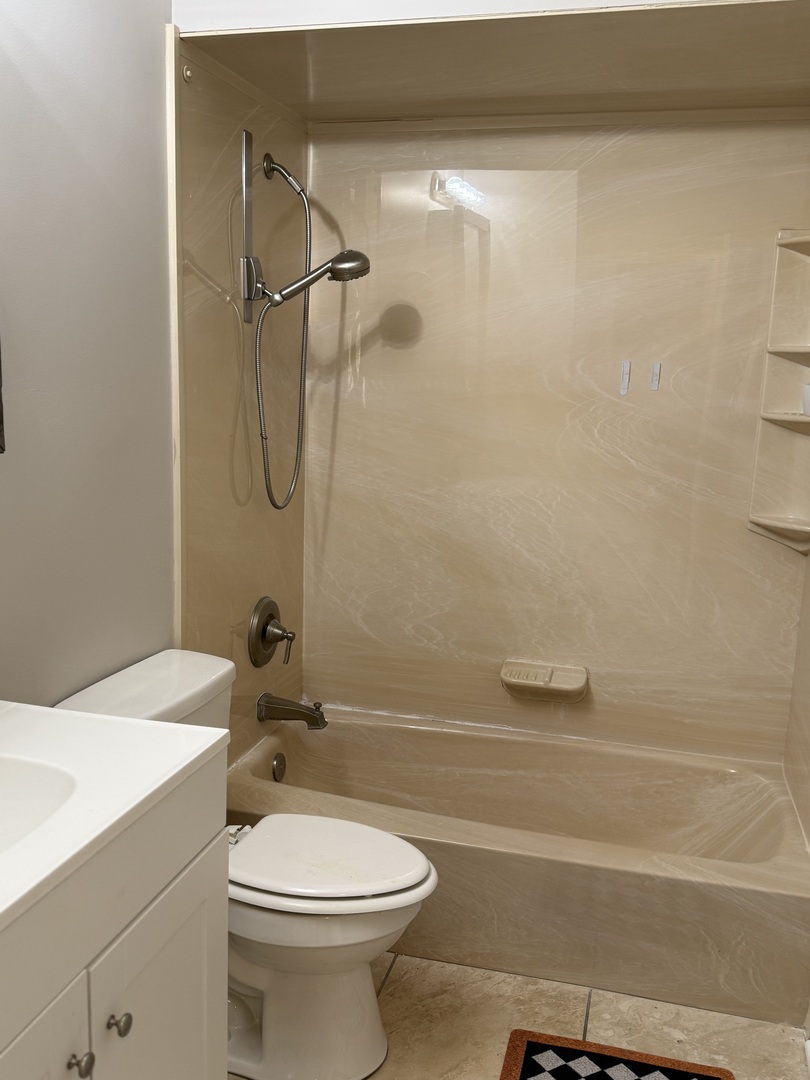 19380 Wolf Road, Unit 5 Mokena, IL 60448 - Photo 18 of 20 a bathroom with a sink a toilet and shower